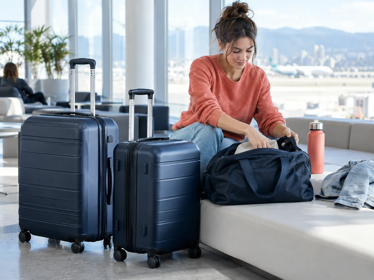 Traveler preparing luggage in a bright travel lounge